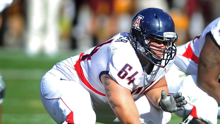Nov. 28, 2009; Tempe, AZ, USA; Arizona Wildcats center (64) Colin Baxter against the Arizona State Sun Devils at Sun Devil Stadium. Arizona defeated Arizona State 20-17. Mandatory Credit: Mark J. Rebilas-Imagn Images Nov. 28, 2009; Tempe, AZ, USA; Arizona Wildcats center (64) Colin Baxter against the Arizona State Sun Devils at Sun Devil Stadium. Arizona defeated Arizona State 20-17. Mandatory Credit: Mark J. Rebilas-Imagn Images