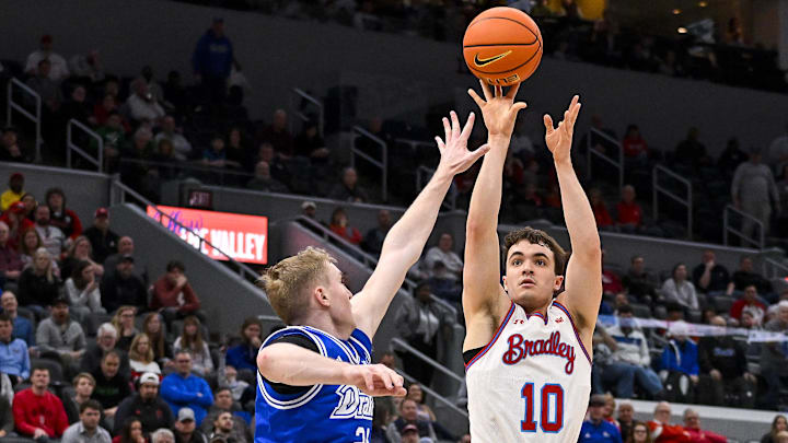Mar 5, 2023; St. Louis, MO, USA; Bradley Braves guard Connor Hickman (10) shoots as Drake Bulldogs