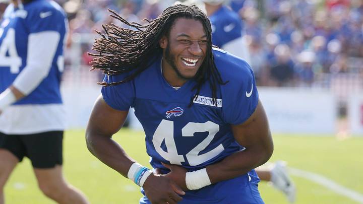 Bills linebacker Dorian Williams breaks into laughter as he jokes with teammates before the start of day three of the Buffalo Bills training camp. Bills linebacker Dorian Williams breaks into laughter as he jokes with teammates before the start of day three of the Buffalo Bills training camp.