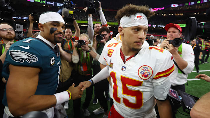 Feb 9, 2025; New Orleans, LA, USA; Philadelphia Eagles quarterback Jalen Hurts (1) shakes hands with Kansas City Chiefs quarterback Patrick Mahomes (15) after Super Bowl LIX at Ceasars Superdome. Mandatory Credit: Mark J. Rebilas-Imagn Images Feb 9, 2025; New Orleans, LA, USA; Philadelphia Eagles quarterback Jalen Hurts (1) shakes hands with Kansas City Chiefs quarterback Patrick Mahomes (15) after Super Bowl LIX at Ceasars Superdome. Mandatory Credit: Mark J. Rebilas-Imagn Images
