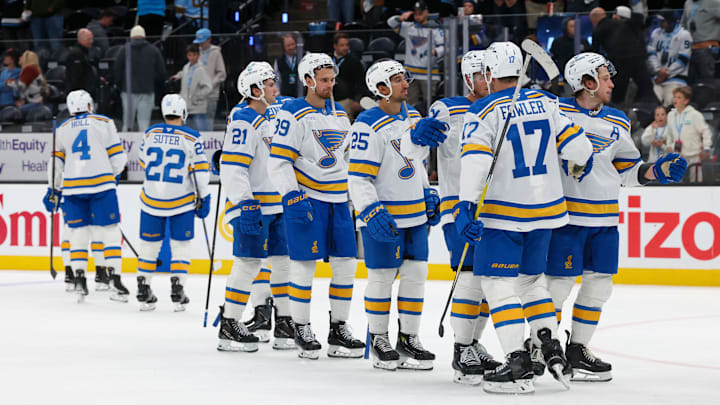 Apr 16, 2026; Salt Lake City, Utah, USA; The St. Louis Blues celebrate after defeating the Utah Mammoth at Delta Center. Mandatory Credit: Rob Gray-Imagn Images