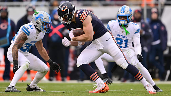 Cole Kmet puts his head down and plows ahead against the Lions. There seems little doubt his target count will drop in 2025.