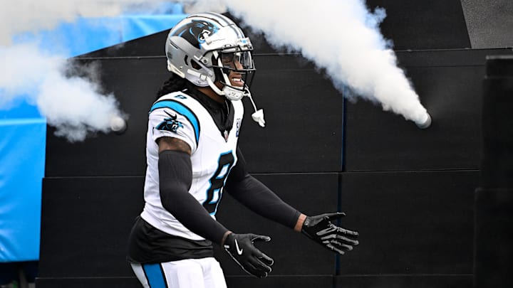 Dec 15, 2024; Charlotte, North Carolina, USA;  Carolina Panthers cornerback Jaycee Horn (8) runs on to the field before the game at Bank of America Stadium. Mandatory Credit: Bob Donnan-Imagn Images