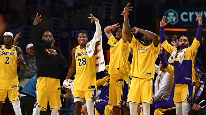 Apr 11, 2025; Los Angeles, California, USA; Los Angeles Lakers forward Jarred Vanderbilt (2), forward LeBron James (23), forward Rui Hachimura (28), center Jaxson Hayes (11), and Los Angeles Lakers guard Gabe Vincent (7) celebrate after scoring against the Houston Rockets during the second half at Crypto.com Arena. Mandatory Credit: Jonathan Hui-Imagn Images