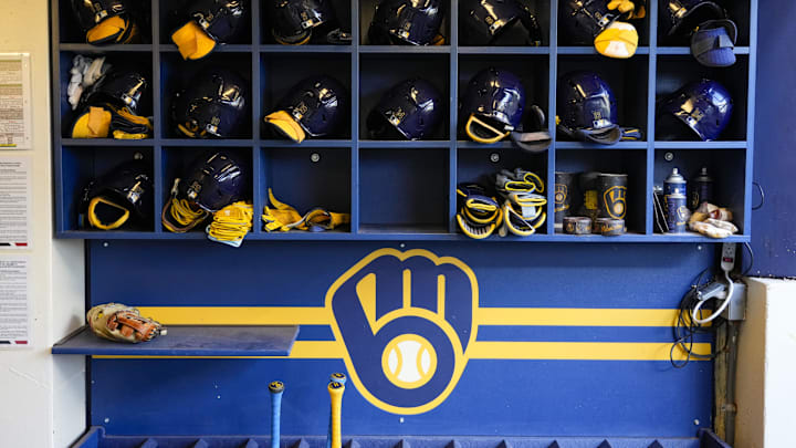 Sep 17, 2024; Milwaukee, Wisconsin, USA;  General view of batting helmets inside the Milwaukee Brewers dugout prior to the game against the Philadelphia Phillies at American Family Field. Mandatory Credit: Jeff Hanisch-Imagn Images