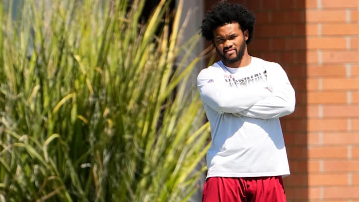 Arizona Cardinals quarterback Kyler Murray (1) watches his teammates practice during minicamp at the