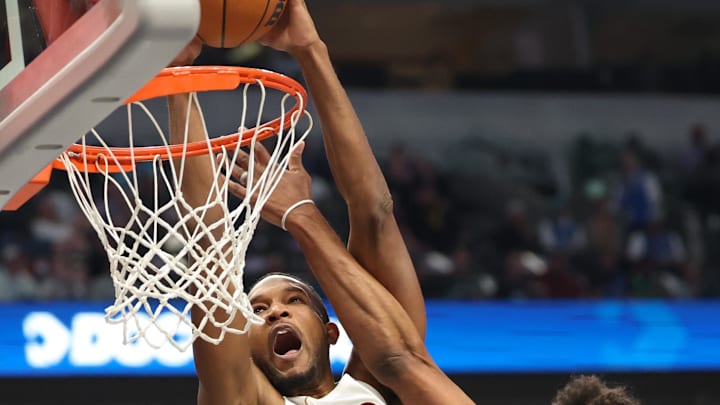Mar 13, 2026; Dallas, Texas, USA;  Cleveland Cavaliers center Evan Mobley (4) shoots as Dallas Mavericks forward Marvin Bagley III (35) defends during the first half at American Airlines Center. Mandatory Credit: Kevin Jairaj-Imagn Images