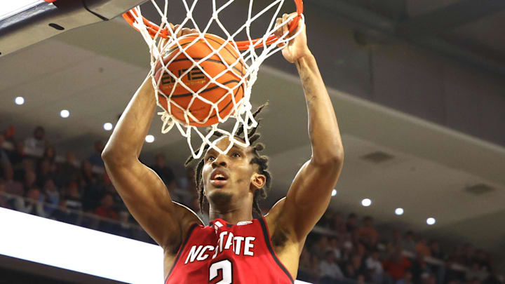 Dec 3, 2025; Auburn, Alabama, USA; NC State Wolfpack guard Jr. Paul McNeil (2) dunks during the first half against the Auburn Tigers at Neville Arena. Dec 3, 2025; Auburn, Alabama, USA; NC State Wolfpack guard Jr. Paul McNeil (2) dunks during the first half against the Auburn Tigers at Neville Arena.