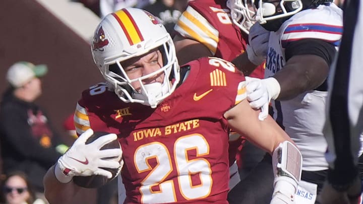 Iowa State Cyclones' running back Carson Hansen (26) runs with the ball for a first down against Kansas during the first quarter in the senior day on Nov. 22, 2025, at Jack Trice Stadium in Ames, Iowa Iowa State Cyclones' running back Carson Hansen (26) runs with the ball for a first down against Kansas during the first quarter in the senior day on Nov. 22, 2025, at Jack Trice Stadium in Ames, Iowa