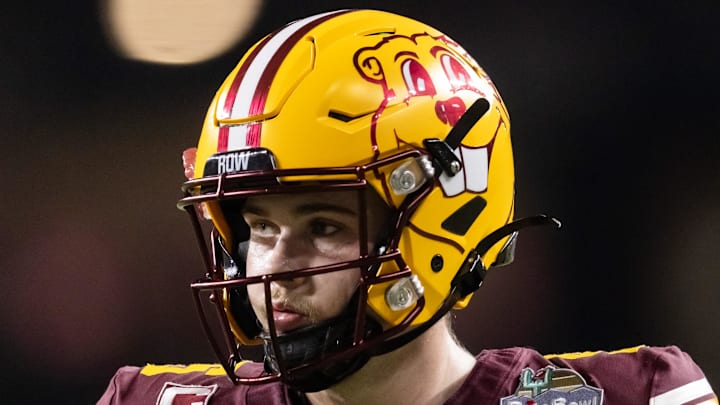 Dec 26, 2025; Phoenix, AZ, USA; Minnesota Golden Gophers quarterback Drake Lindsey (5) against the New Mexico Lobos during the Rate Bowl at Chase Field. Mandatory Credit: Mark J. Rebilas-Imagn Images