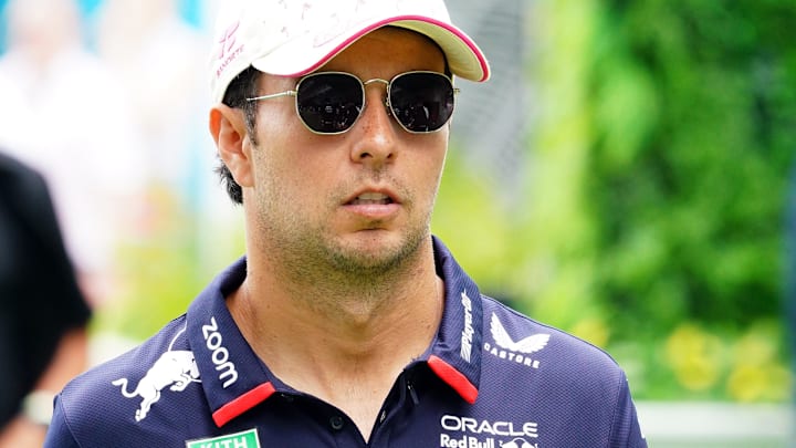 May 5, 2024; Miami Gardens, Florida, USA; Red Bull Racing driver Sergio Perez (11) arrives in the paddock before the Miami Grand Prix at Miami International Autodrome. Mandatory Credit: John David Mercer-USA TODAY Sports May 5, 2024; Miami Gardens, Florida, USA; Red Bull Racing driver Sergio Perez (11) arrives in the paddock before the Miami Grand Prix at Miami International Autodrome. Mandatory Credit: John David Mercer-USA TODAY Sports