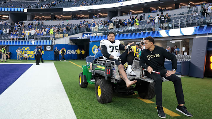 New Orleans Saints RT Taliese Fuaga (75) gets carted off the field during a game against the Los Angeles Rams on Nov. 2, 2025. New Orleans Saints RT Taliese Fuaga (75) gets carted off the field during a game against the Los Angeles Rams on Nov. 2, 2025.