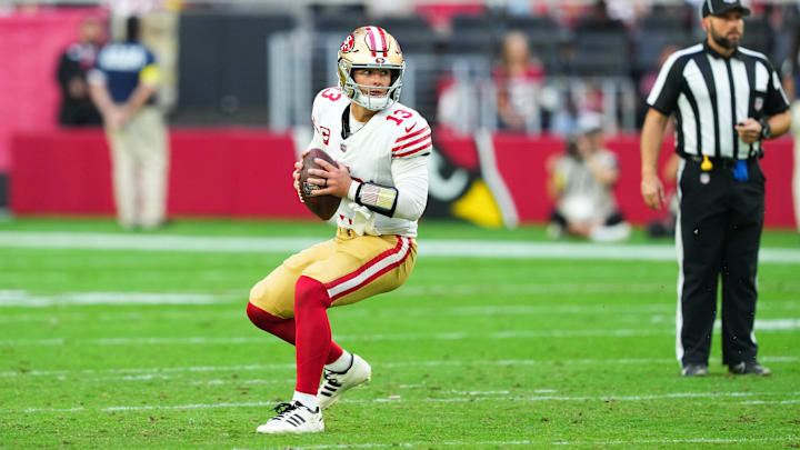 Nov 16, 2025; Glendale, Arizona, USA; San Francisco 49ers quarterback Brock Purdy (13) prepares to throw the ball in the third quarter against the Arizona Cardinals at State Farm Stadium. Mandatory Credit: Joe Camporeale-Imagn Images