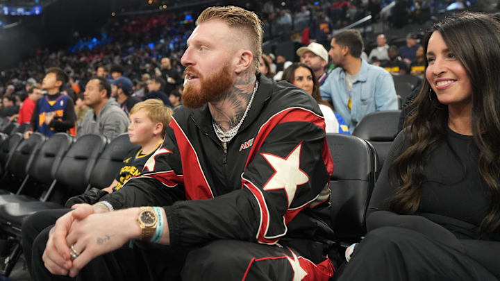 Raiders defensive end Maxx Crosby and wife Rachel Washburn attend an NBA game between the Golden State Warriors and the LA Clippers.