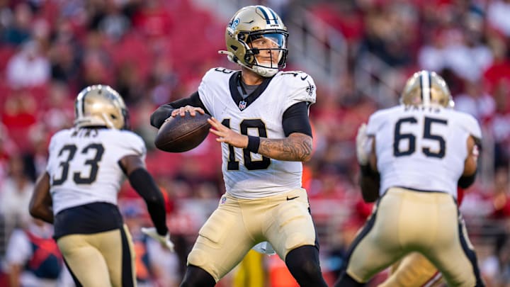 New Orleans Saints quarterback Spencer Rattler (18) looks to pass against the San Francisco 49ers New Orleans Saints quarterback Spencer Rattler (18) looks to pass against the San Francisco 49ers