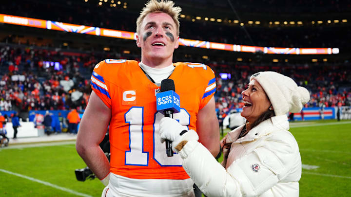 CBS Sports reporter Tracy Wolfson interviews Denver Broncos quarterback Bo Nix (10) following the win against the Kansas City Chiefs at Empower Field at Mile High.
