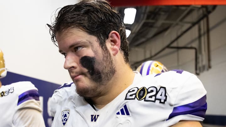 Husky offensive tackle Roger Rosengarten heads to the field to face  Michigan in the 2024 College Football Playoff national championship game.