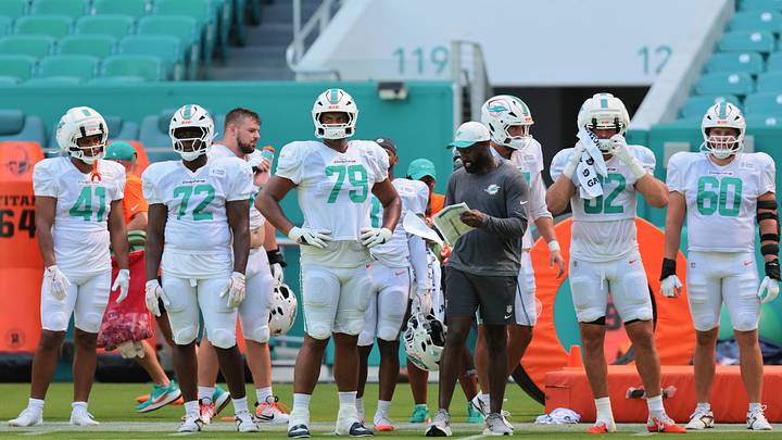 Miami Dolphins offensive tackle Kevin Cline (79) looks on from the sideline during practice at Hard Rock Stadium. Miami Dolphins offensive tackle Kevin Cline (79) looks on from the sideline during practice at Hard Rock Stadium.