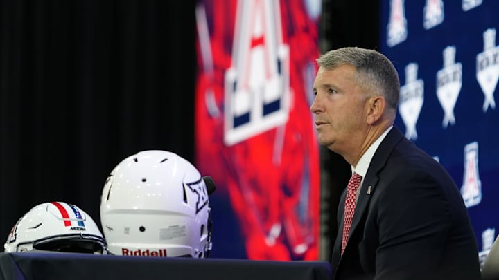 Jul 9, 2025; Frisco, TX, USA; Arizona head coach Brent Brennan speaks with the media during 2025 Big 12 Football Media Days at The Star. Mandatory Credit: Raymond Carlin III-Imagn Images Jul 9, 2025; Frisco, TX, USA; Arizona head coach Brent Brennan speaks with the media during 2025 Big 12 Football Media Days at The Star. Mandatory Credit: Raymond Carlin III-Imagn Images