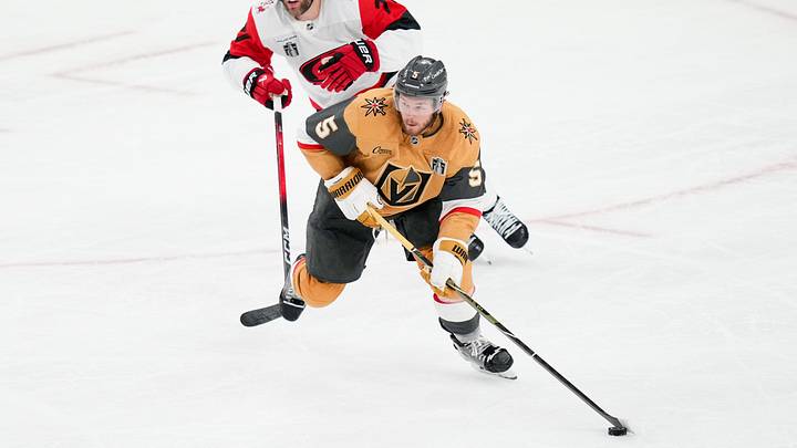 Jun 6, 2026; Las Vegas, Nevada, USA; Vegas Golden Knights defenseman Jeremy Lauzon (5) controls the puck defended by Carolina Hurricanes left wing Taylor Hall (71) during overtime in game three of the 2026 Stanley Cup Final at T-Mobile Arena. Mandatory Credit: Lucas Peltier-Imagn Images Jun 6, 2026; Las Vegas, Nevada, USA; Vegas Golden Knights defenseman Jeremy Lauzon (5) controls the puck defended by Carolina Hurricanes left wing Taylor Hall (71) during overtime in game three of the 2026 Stanley Cup Final at T-Mobile Arena. Mandatory Credit: Lucas Peltier-Imagn Images