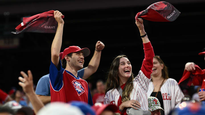 Philadelphia Phillies fans react in the ninth inning against the New York Mets during game two of the NLDS for the 2024 MLB Playoffs at Citizens Bank Park.