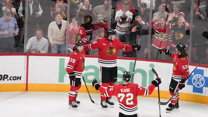 Apr 15, 2026; Chicago, Illinois, USA; Chicago Blackhawks defenseman Louis Crevier (46) celebrates his goal against the San Jose Sharks during the third period at United Center. Mandatory Credit: David Banks-Imagn Images