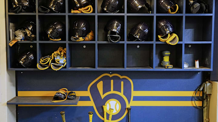 Apr 5, 2025; Milwaukee, Wisconsin, USA; General view of Milwaukee Brewers batting helmets in the dugout prior to the game against the Cincinnati Reds at American Family Field. Mandatory Credit: Jeff Hanisch-Imagn Images Apr 5, 2025; Milwaukee, Wisconsin, USA; General view of Milwaukee Brewers batting helmets in the dugout prior to the game against the Cincinnati Reds at American Family Field. Mandatory Credit: Jeff Hanisch-Imagn Images