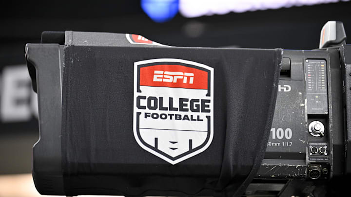 Dec 6, 2025; Arlington, TX, USA; A view of a tv camera and the ESPN college football logo before the game between the Texas Tech Red Raiders and the BYU Cougars at AT&T Stadium. Mandatory Credit: Jerome Miron-Imagn Images Dec 6, 2025; Arlington, TX, USA; A view of a tv camera and the ESPN college football logo before the game between the Texas Tech Red Raiders and the BYU Cougars at AT&T Stadium. Mandatory Credit: Jerome Miron-Imagn Images