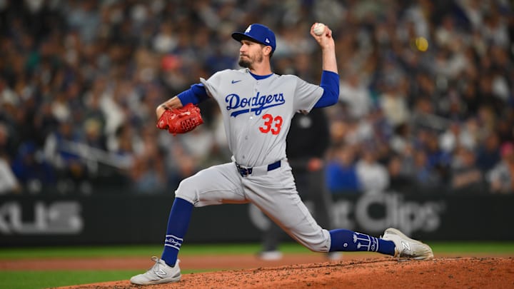 Sep 27, 2025; Seattle, Washington, USA; Los Angeles Dodgers relief pitcher Andrew Heaney (33) pitches to the Seattle Mariners during the fourth inning at T-Mobile Park. Mandatory Credit: Steven Bisig-Imagn Images Sep 27, 2025; Seattle, Washington, USA; Los Angeles Dodgers relief pitcher Andrew Heaney (33) pitches to the Seattle Mariners during the fourth inning at T-Mobile Park. Mandatory Credit: Steven Bisig-Imagn Images