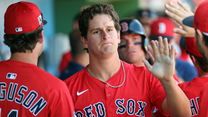 Boston Red Sox outfielder Roman Anthony (48) is congratulated after he scored a run against the Philadelphia Phillies  during the third inning  at BayCare Ballpark in a spring training game in Clearwater, Fla., on Feb. 28, 2025.
