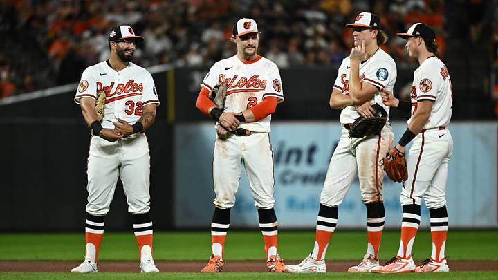 Aug 22, 2026; Baltimore, Maryland, USA; Baltimore Orioles Baltimore Orioles third baseman Christian Encarnacion-Strand (32) and shortstop Gunnar Henderson (2) and first baseman Coby Mayo (16) and second baseman Jackson Holliday (7) await a pitching change during the seventh inning against the Tampa Bay Rays at Oriole Park at Camden Yards. Mandatory Credit: James A. Pittman-Imagn Images Aug 22, 2026; Baltimore, Maryland, USA; Baltimore Orioles Baltimore Orioles third baseman Christian Encarnacion-Strand (32) and shortstop Gunnar Henderson (2) and first baseman Coby Mayo (16) and second baseman Jackson Holliday (7) await a pitching change during the seventh inning against the Tampa Bay Rays at Oriole Park at Camden Yards. Mandatory Credit: James A. Pittman-Imagn Images