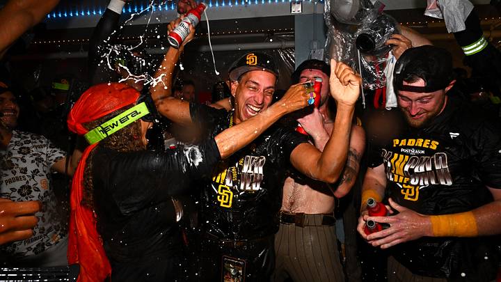 Sep 24, 2026; Los Angeles, California, USA; San Diego Padres owners Jose E. Feliciano and Kwanza Jones celebrate with the team after securing a playoff spot at Dodger Stadium. Mandatory Credit: William Liang-Imagn Images Sep 24, 2026; Los Angeles, California, USA; San Diego Padres owners Jose E. Feliciano and Kwanza Jones celebrate with the team after securing a playoff spot at Dodger Stadium. Mandatory Credit: William Liang-Imagn Images