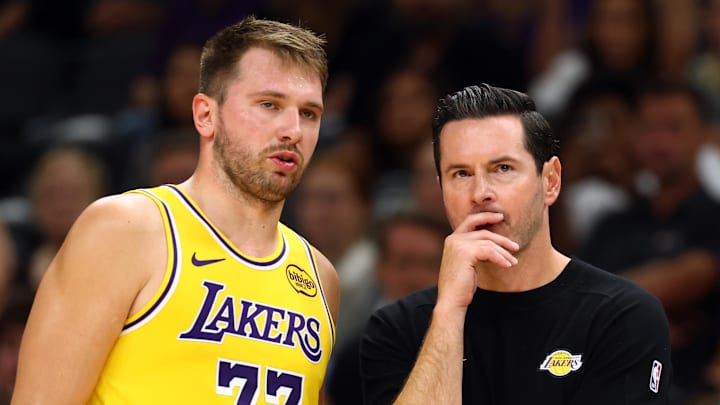 Los Angeles Lakers guard Luka Doncic (77) with head coach JJ Redick