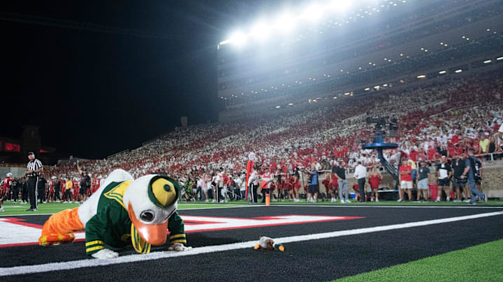 The Oregon Duck does push-ups after the team scores against Texas Tech, Saturday, Sept. 9, 2023, at Jones AT&T Stadium.