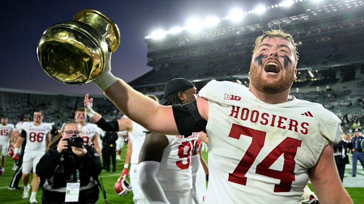 Indiana offensive lineman Bray Lynch holds The Old Brass Spittoon Trophy after the Hoosiers beat Michigan State in 2024. Indiana offensive lineman Bray Lynch holds The Old Brass Spittoon Trophy after the Hoosiers beat Michigan State in 2024.