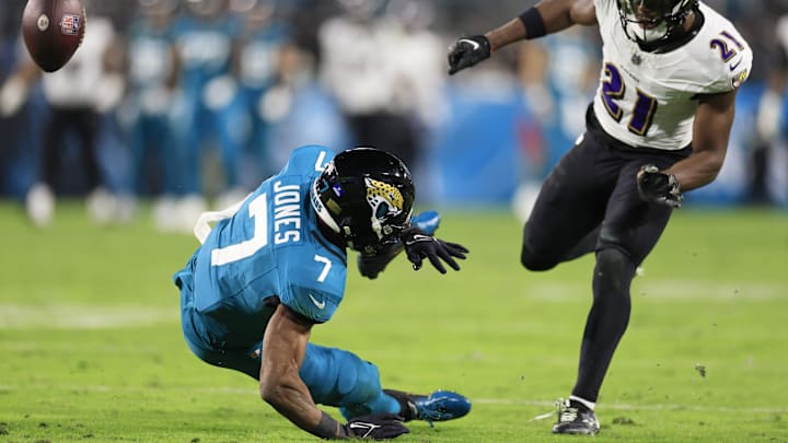 Jacksonville Jaguars wide receiver Zay Jones (7) can   t haul in a reception as Baltimore Ravens cornerback Brandon Stephens (21) defends during the second quarter of a regular season NFL football matchup Sunday, Dec. 17, 2023 at EverBank Stadium in Jacksonville, Fla. [Corey Perrine/Florida Times-Union]