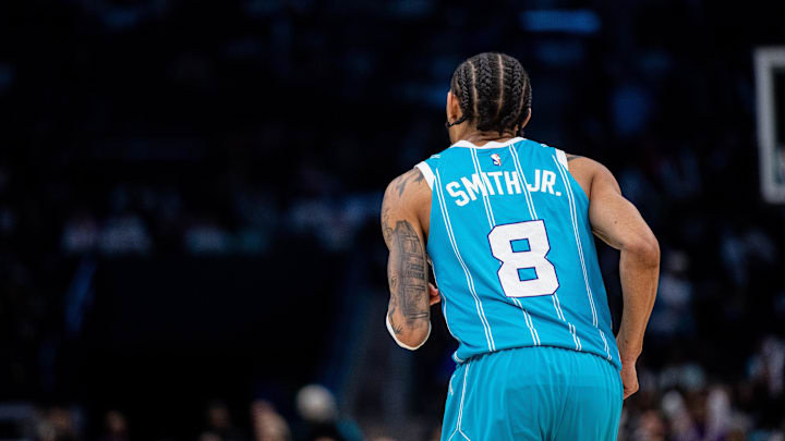 Mar 8, 2025; Charlotte, North Carolina, USA; Charlotte Hornets guard Nick Smith Jr. (8) runs back against the Brooklyn Nets during the third quarter at Spectrum Center. Mandatory Credit: Scott Kinser-Imagn Images