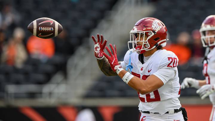 Washington State Cougars running back Leo Pulalasi (20) catches a pass during warmups before a 2025 game against the Oregon State Beavers at Reser Stadium. Washington State Cougars running back Leo Pulalasi (20) catches a pass during warmups before a 2025 game against the Oregon State Beavers at Reser Stadium.