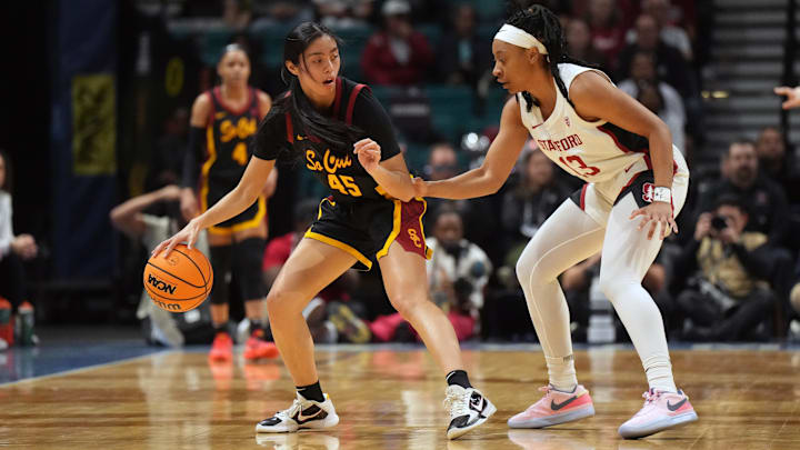 Mar 10, 2024; Las Vegas, NV, USA; Southern California Trojans guard Kayla Padilla (45) dribbles against Stanford Cardinal guard Chloe Clardy (13) jn the first half of the Pac-12 Tournament women's championship game at MGM Grand Garden Arena. Mandatory Credit: Kirby Lee-Imagn Images Mar 10, 2024; Las Vegas, NV, USA; Southern California Trojans guard Kayla Padilla (45) dribbles against Stanford Cardinal guard Chloe Clardy (13) jn the first half of the Pac-12 Tournament women's championship game at MGM Grand Garden Arena. Mandatory Credit: Kirby Lee-Imagn Images
