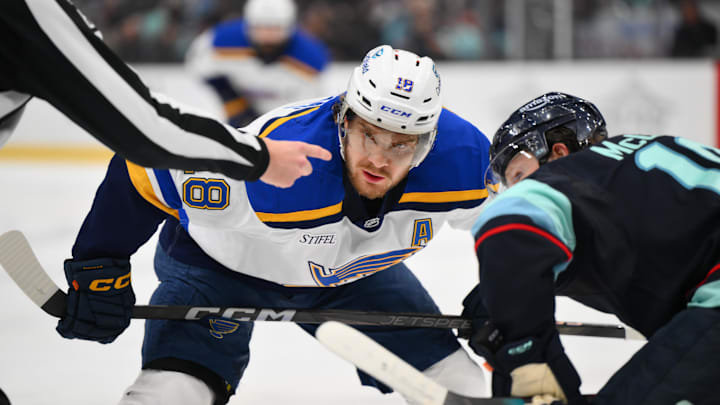 Apr 12, 2025; Seattle, Washington, USA; St. Louis Blues center Robert Thomas (18) waits for the puck to drop during a face off in the first period against the Seattle Kraken at Climate Pledge Arena. Mandatory Credit: Steven Bisig-Imagn Images