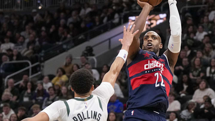 Dec 31, 2025; Milwaukee, Wisconsin, USA; Washington Wizards forward Khris Middleton (22) shoots over Milwaukee Bucks guard Ryan Rollins (13) during the fourth quarter at Fiserv Forum. Mandatory Credit: Jeff Hanisch-Imagn Images Dec 31, 2025; Milwaukee, Wisconsin, USA; Washington Wizards forward Khris Middleton (22) shoots over Milwaukee Bucks guard Ryan Rollins (13) during the fourth quarter at Fiserv Forum. Mandatory Credit: Jeff Hanisch-Imagn Images