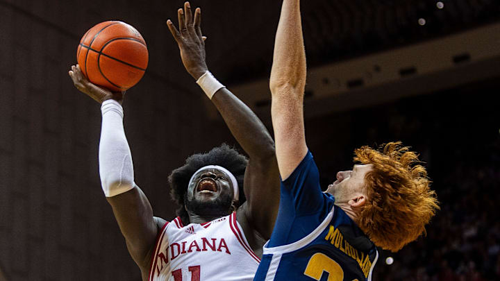 Indiana's Oumar Ballo (11) shoots over Chattanooga's Collin Mulholland (21) during the Indiana versus Chattanooga men's basketball game at Simon Skjodt Assembly Hall on Saturday, Dec. 21, 2204.