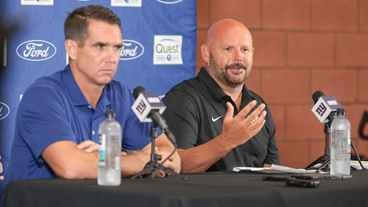 Jul 24, 2024; East Rutherford, NJ, USA; New York Giants  head coach Brian Dabol, left, and general manager Joe Schoen talks with media  at Quest Diagnostics Training Facility. Mandatory Credit: Vincent Carchietta-Imagn Images
