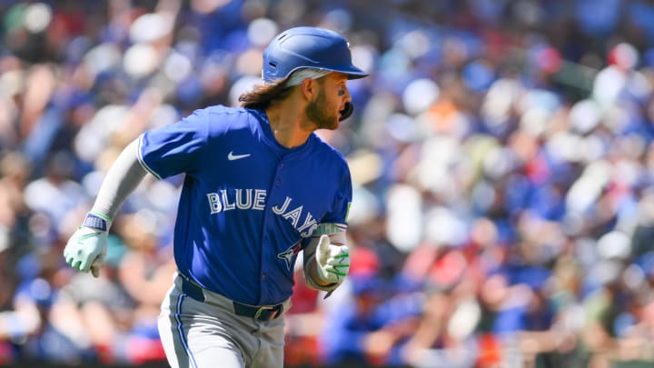 Jul 6, 2024; Seattle, Washington, USA; Toronto Blue Jays shortstop Bo Bichette (11) runs towards first base after hitting a single against the Seattle Mariners during the seventh inning at T-Mobile Park. Jul 6, 2024; Seattle, Washington, USA; Toronto Blue Jays shortstop Bo Bichette (11) runs towards first base after hitting a single against the Seattle Mariners during the seventh inning at T-Mobile Park.