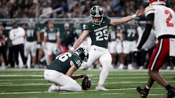 Nov 29, 2025; Detroit, Michigan, USA; Michigan State kicker Martin Connington (29) kicks a field goal against Maryland in the second quarter at Ford Field. Mandatory Credit: Brendan Mullin-Imagn Images