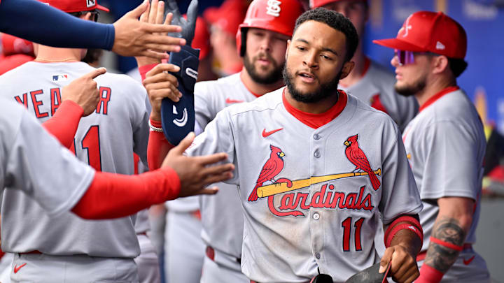 Feb 25, 2025; Dunedin, Florida, USA; St. Louis Cardinals left fielder Victor Scott II (11) celebrates after scoring a run against the Toronto Blue Jays in the first inning of a spring training game at TD Ballpark. Mandatory Credit: Jonathan Dyer-Imagn Images
