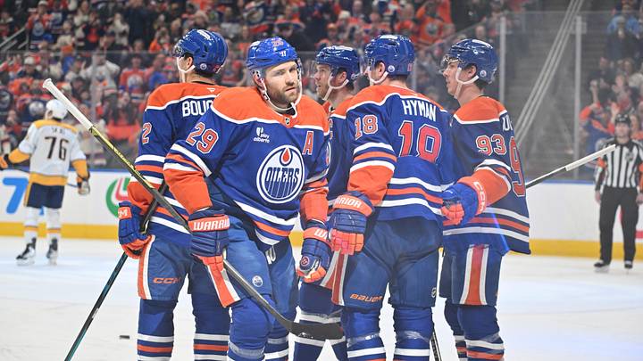 Mar 15, 2026; Edmonton, Alberta, CAN; Edmonton Oilers center Leon Draisaitl (29), left wing Zach Hyman (18) and Oilers center Ryan Nugent-Hopkins (93) celebrate a goal on Nashville Predators goalie Justus Annunen (29) during the first period at Rogers Place. Mandatory Credit: Walter Tychnowicz-Imagn Images