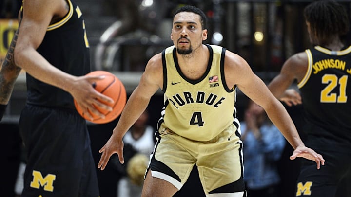 Purdue forward Trey Kaufman-Renn (4) defends against Michigan forward Yaxel Lendeborg (23). Purdue forward Trey Kaufman-Renn (4) defends against Michigan forward Yaxel Lendeborg (23).
