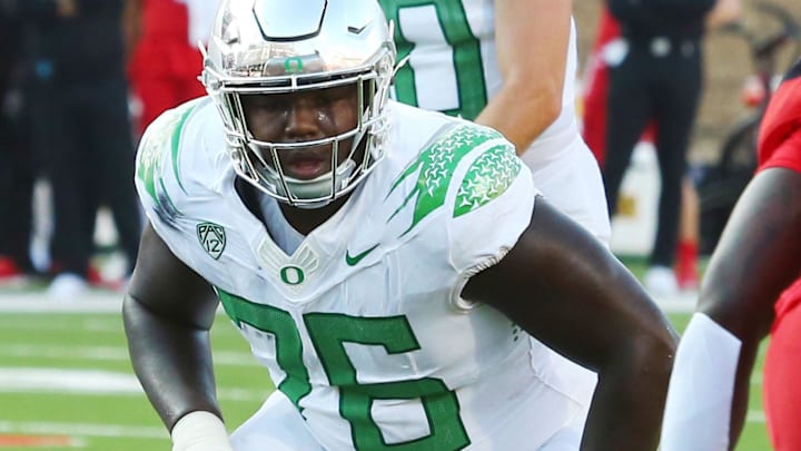 Sep 9, 2023; Lubbock, Texas, USA; Oregon Ducks offensive tackle Josh Conerly Jr. (76) prepares to block in the first half for quarterback Bo Nix (10) in the game against the Texas Tech Red Raiders at Jones AT&T Stadium and Cody Campbell Field. Mandatory Credit: Michael C. Johnson-Imagn Images Sep 9, 2023; Lubbock, Texas, USA; Oregon Ducks offensive tackle Josh Conerly Jr. (76) prepares to block in the first half for quarterback Bo Nix (10) in the game against the Texas Tech Red Raiders at Jones AT&T Stadium and Cody Campbell Field. Mandatory Credit: Michael C. Johnson-Imagn Images