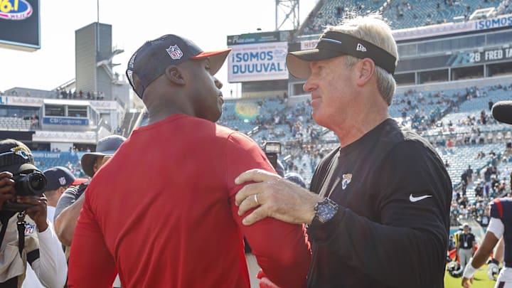 Sep 24, 2023; Jacksonville, Florida, USA; Houston Texans head coach Demeco Ryans and Jacksonville Jaguars head coach Doug Pederson shake hands after the game at EverBank Stadium. Mandatory Credit: Morgan Tencza-Imagn Images